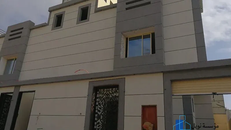دهانات واجهات المنازل في حي الشاطئ بألوان جذابة